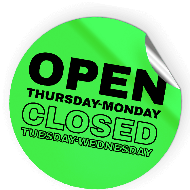 Sticker saying "Open Thursday-Monday. Closed Tuesday-Wednesday"